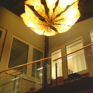 CHANDELIER TRIANGLES IN GLAZED STAIRCASE
